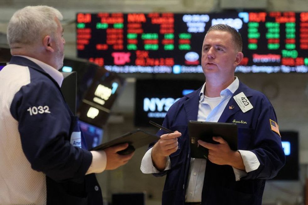 Wall Street slips as jobs growth boosts rate hike bets
