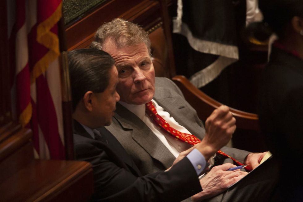 AT&T charged with trying to illegally influence Illinois ex-Speaker Michael Madigan