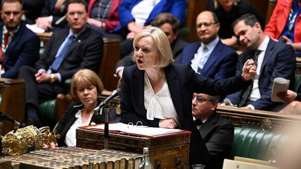 Liz Truss' government in meltdown as top minister quits and Tory MPs squabble in parliament