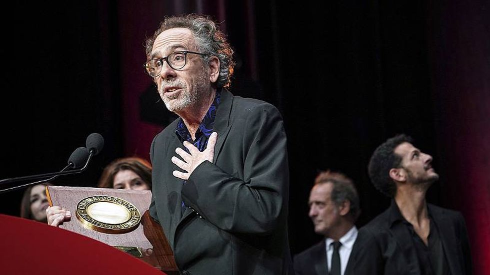 Tim Burton moved to tears as he received recognition for decades-long career at the Lumière Festival