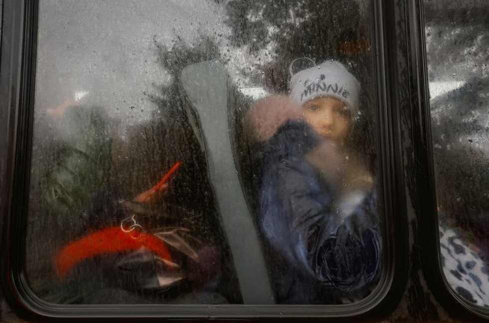 Russian strikes cause blackouts in much of Ukraine, more flee Kherson