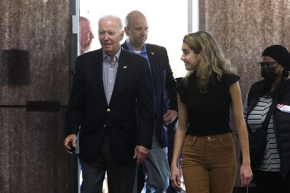 Biden casts early vote, vows to visit more states in coming days