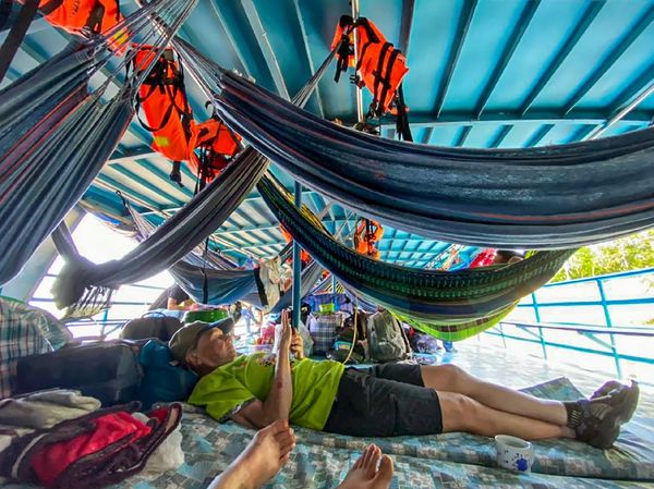 Indigenous people free tourists taken in Peruvian Amazon