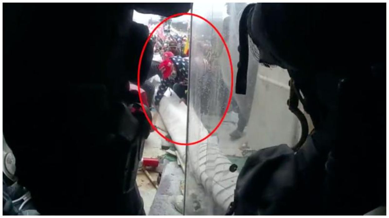 Newly released video shows Capitol rioter assaulting cops with projectiles