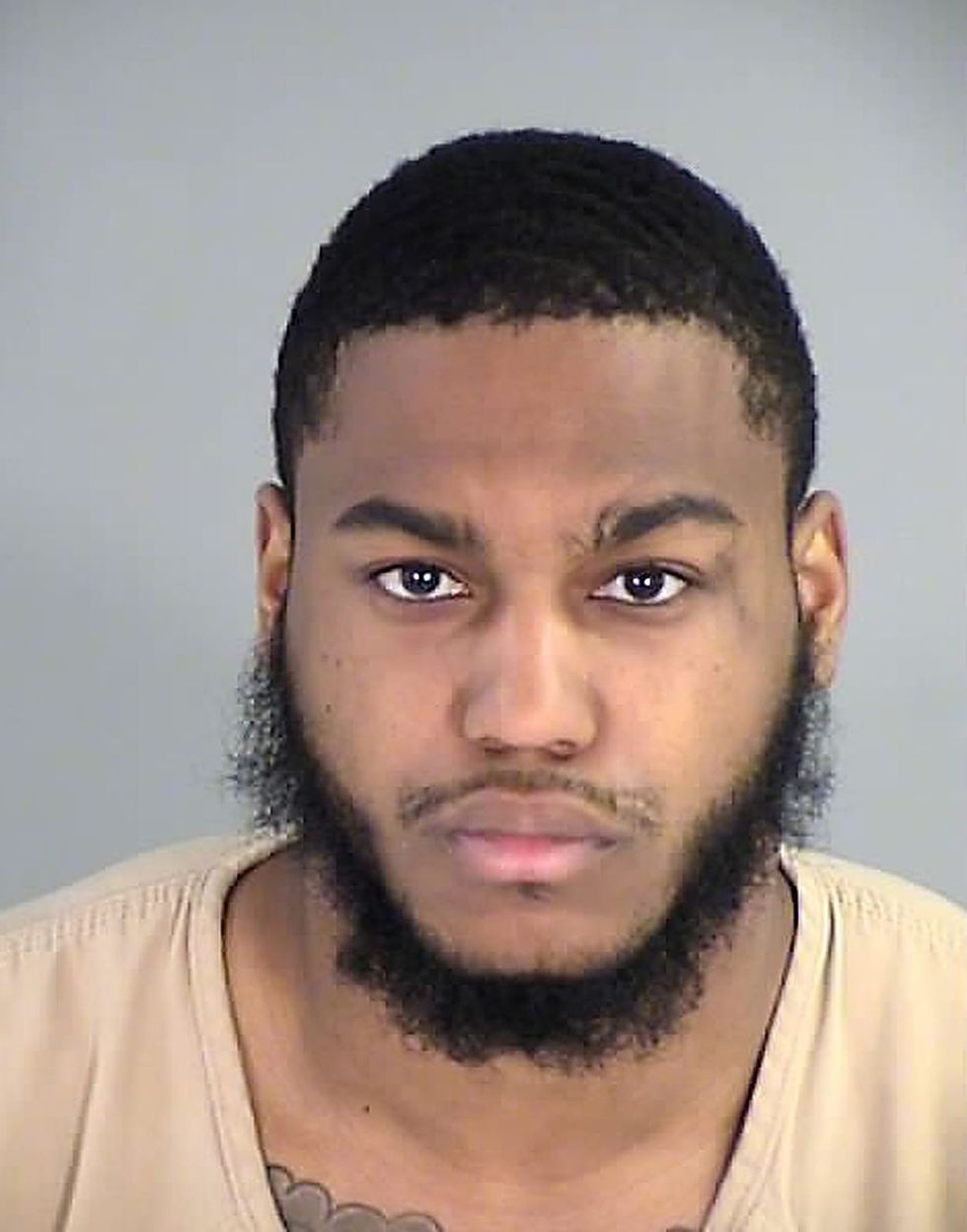University of Virginia shooting suspect bought 2 guns after failing background check last year