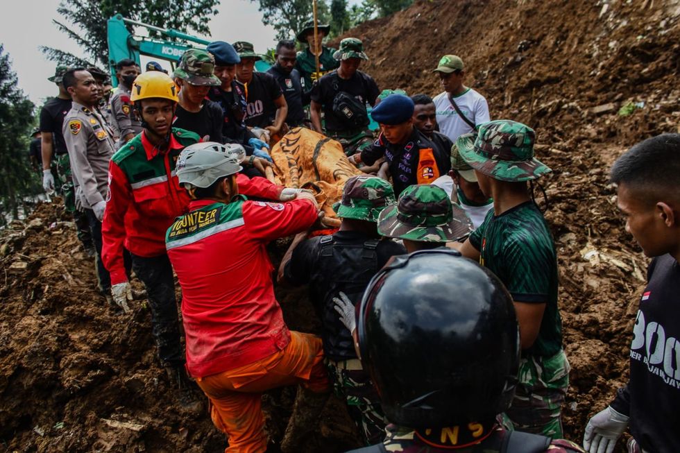 Boy, 6, survives two days under rubble after Indonesian quake