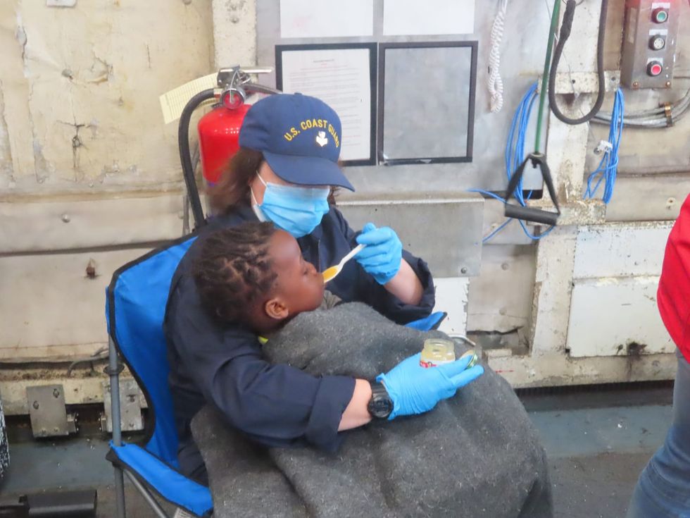 ‘This is obscene’: Haitians angered by babies being sent back after reaching Florida Keys on boat
