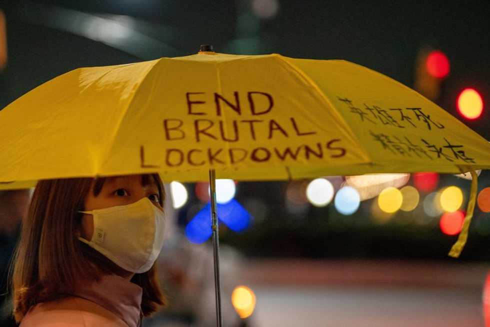 Overseas Chinese step up protests as calls mount for change