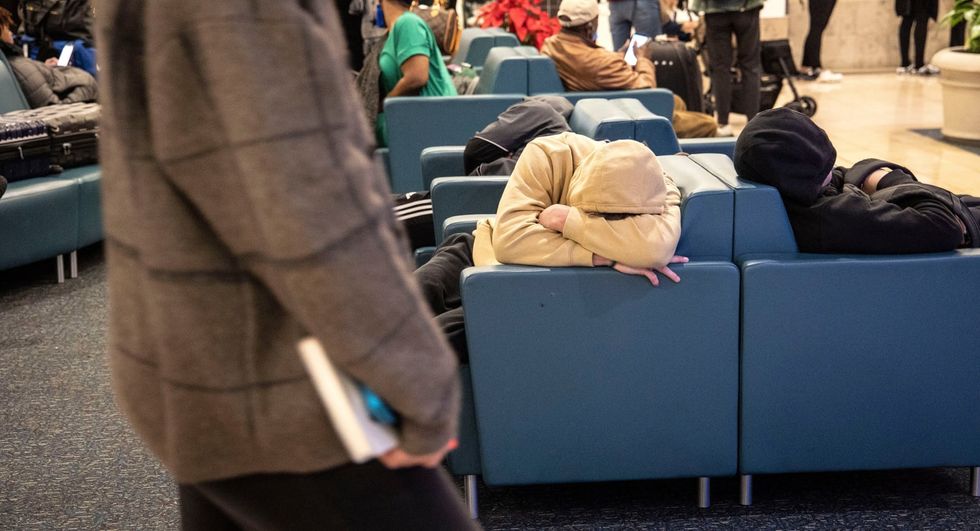Flight cancellations continue in US; Southwest drops more than half its scheduled trips
