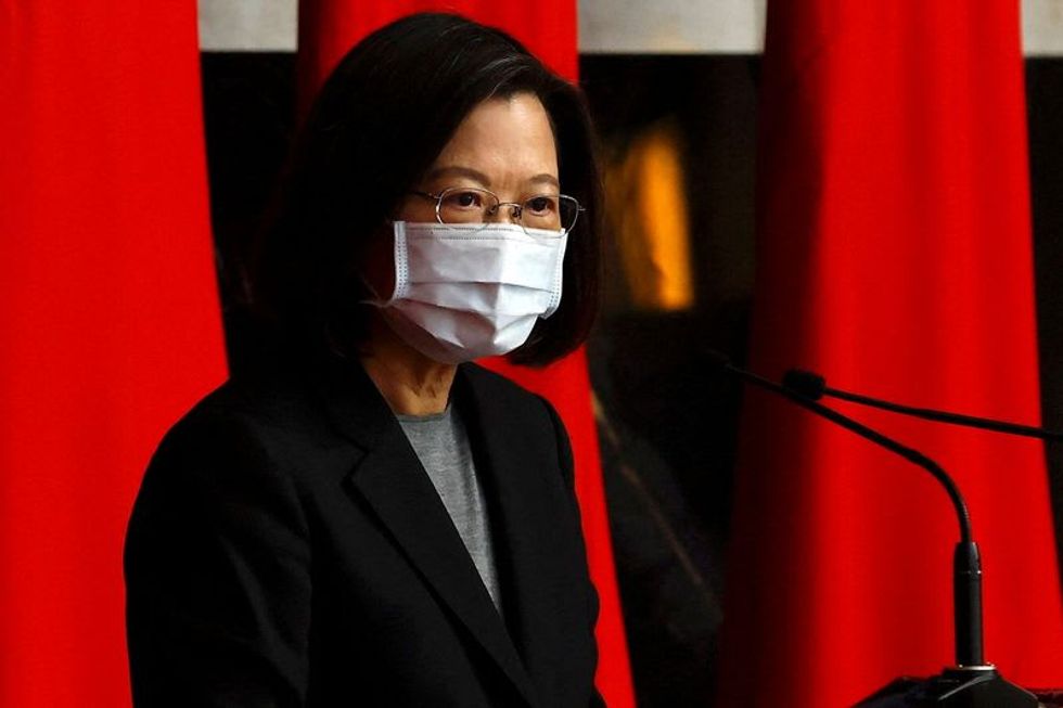 Taiwan president offers China help to deal with COVID surge