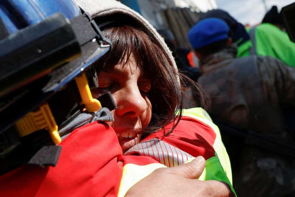 After 104 hours buried by Turkey earthquake, woman brought out alive