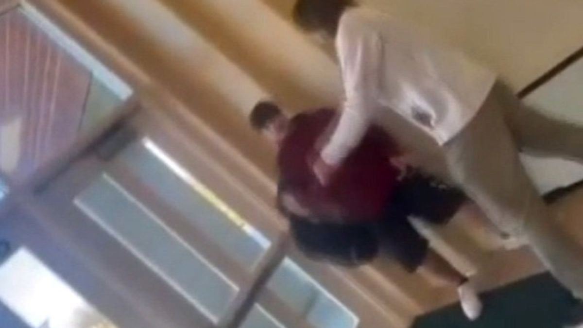 Teacher on leave after being captured on video pushing and swearing at Michigan middle school student
