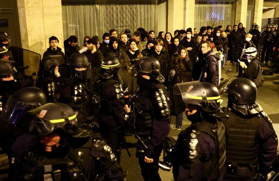 Macron to address nation after government survives no-confidence vote