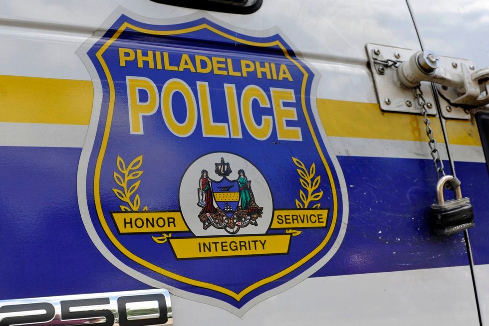A Philly police officer is cleared of racial slur allegations after a viral traffic stop video, commissioner says