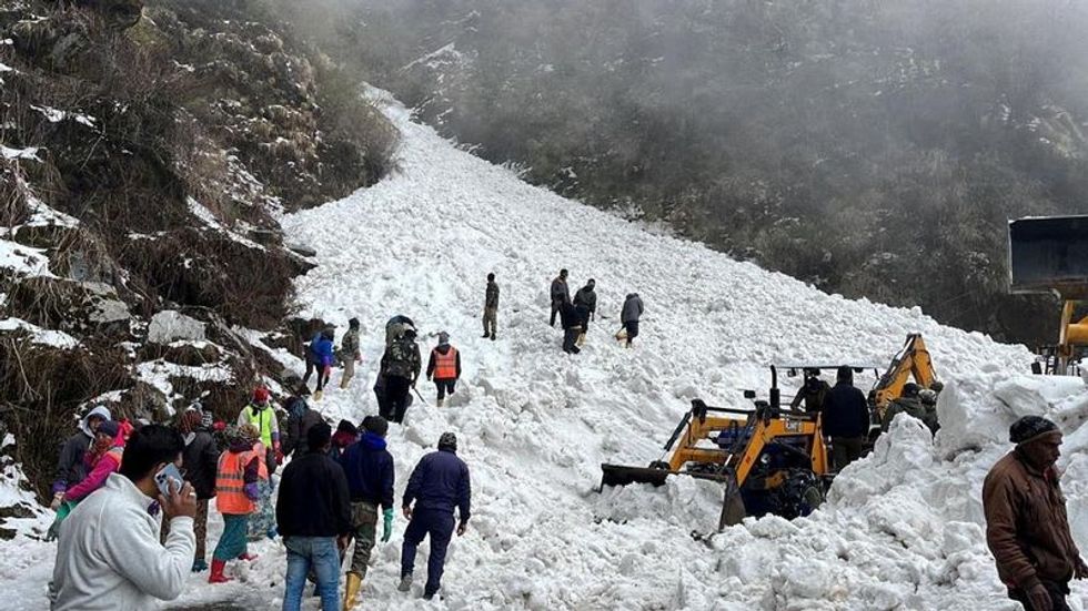India avalanche kills six, injures 30 and traps many more - police
