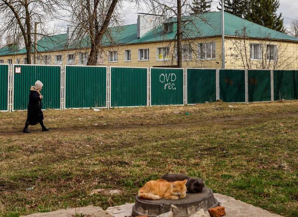 Russian girl who drew anti-war picture leaves orphanage with mother