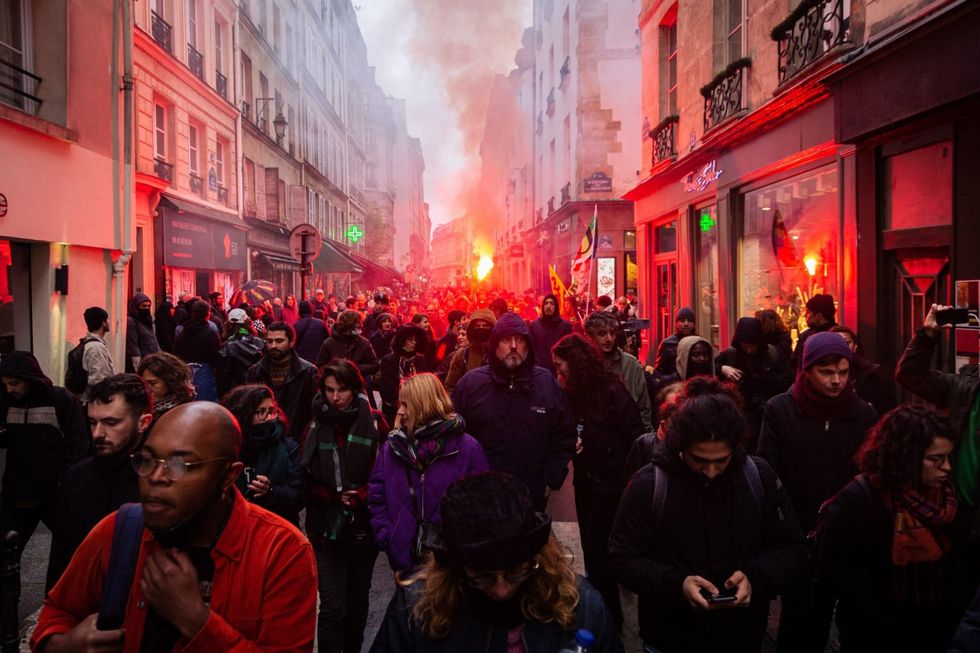 French pension reform is now law but protesters not giving up