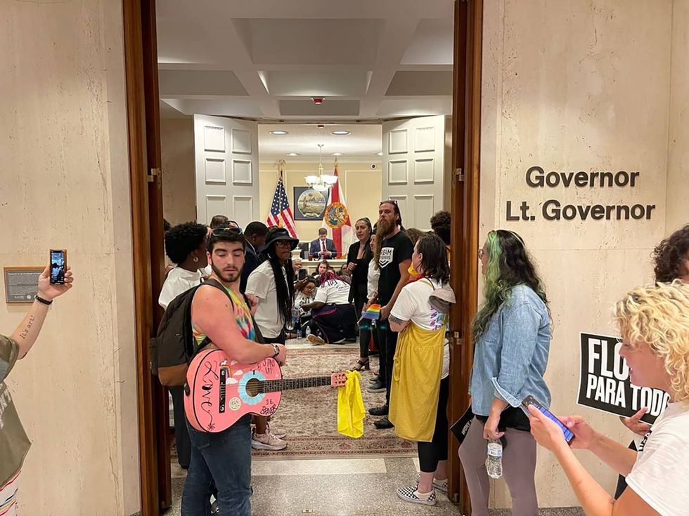 Dozens stage sit-in protest in DeSantis’ office in Florida Capitol