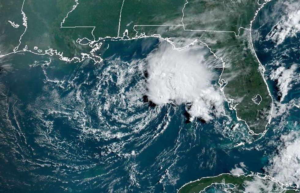 Tropical depression in Gulf slogs south away from Florida, hurricane center says