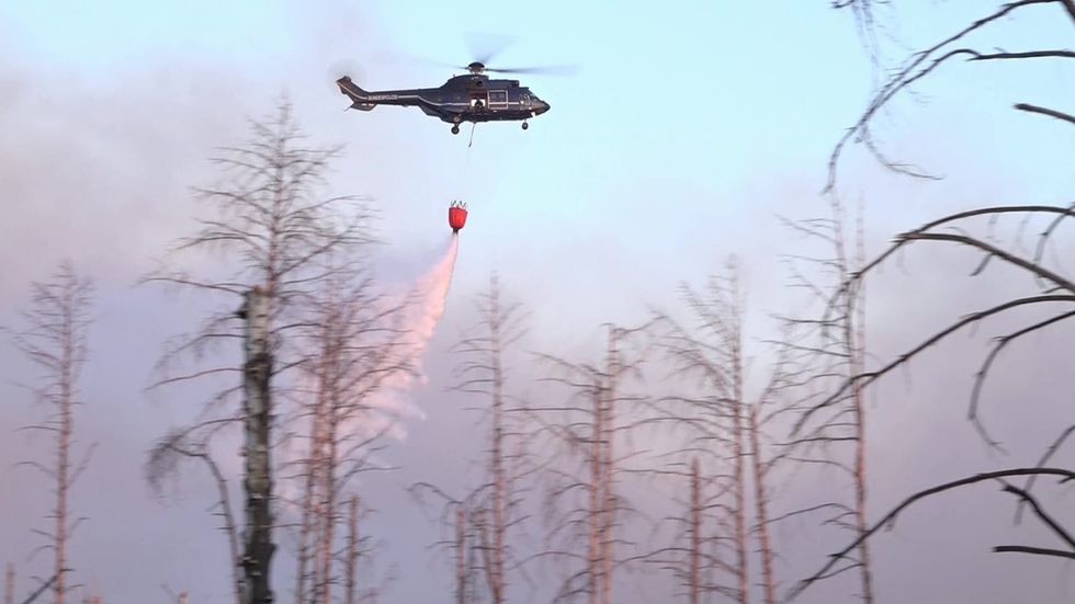 Blaze intensifies in German forest full of old ammunition