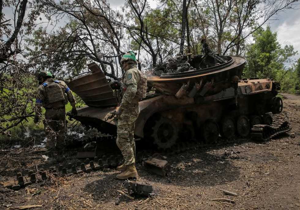 Russia tries to signal normalcy as Ukraine forces advance