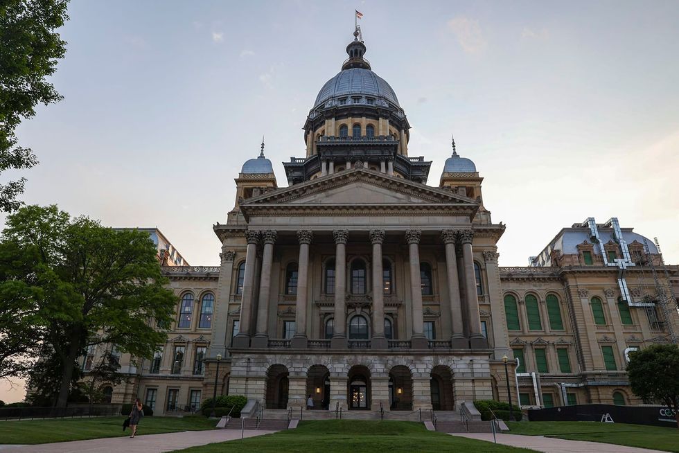 Illinois governor signs bills giving state power over health insurance prices, Affordable Care Act exchange