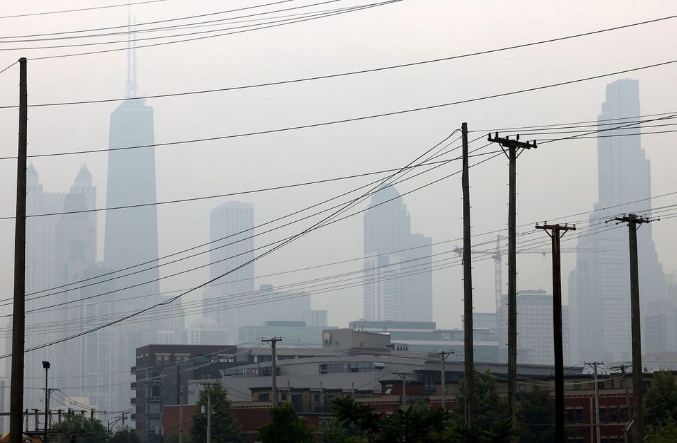 Through the smoky air, the impact of drought clouds the Midwest
