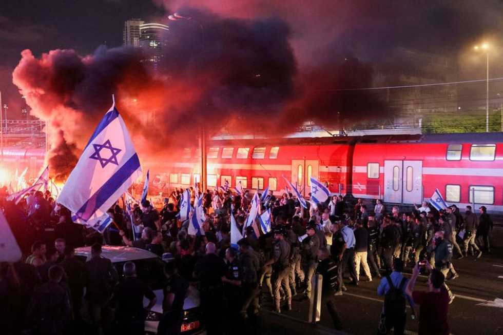 Tel Aviv police chief quits, citing government meddling against protesters