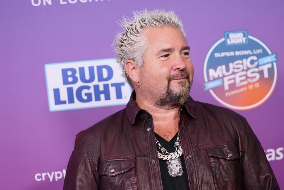 Food Channel's Guy Fieri faces furious blowback after photo with Trump