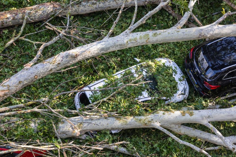 Teenager dies in northern Italy storms as fires close Sicily airport