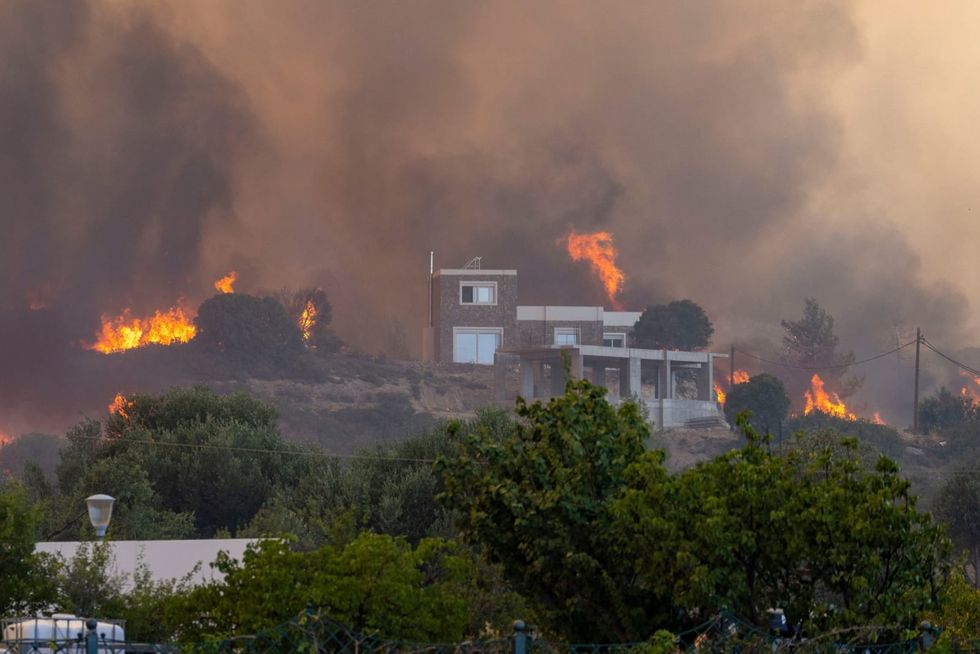 Fires close in on village of Gennadi on Greek island of Rhodes