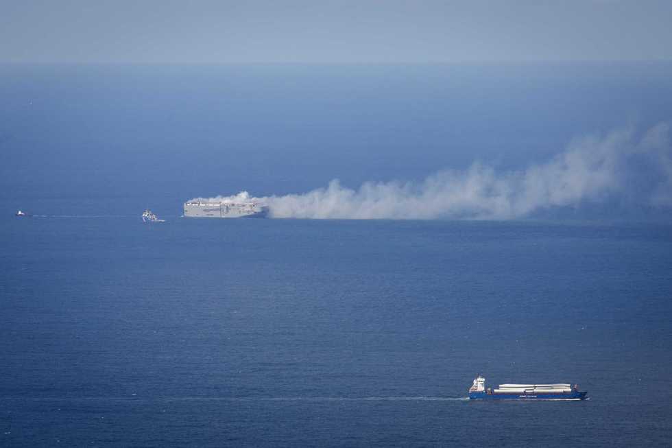 Freighter continues to burn off Dutch coast, risk of oil spill low