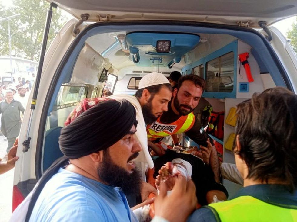 Suicide bomb at political rally in Pakistan kills at least 40, injures 130