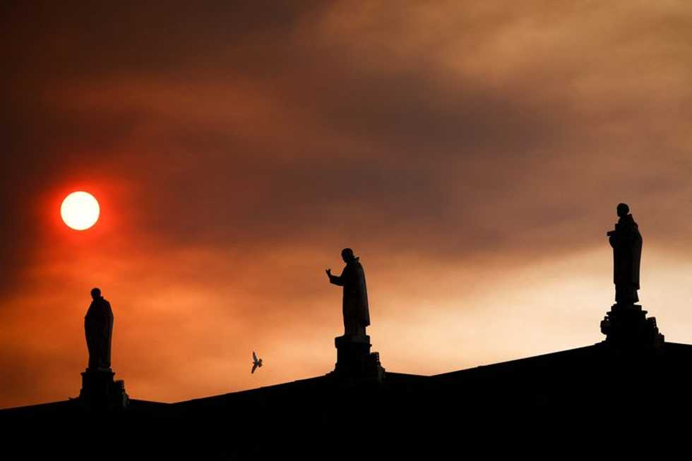 Faithful descend on Portugal's Fatima shrine to see Pope Francis