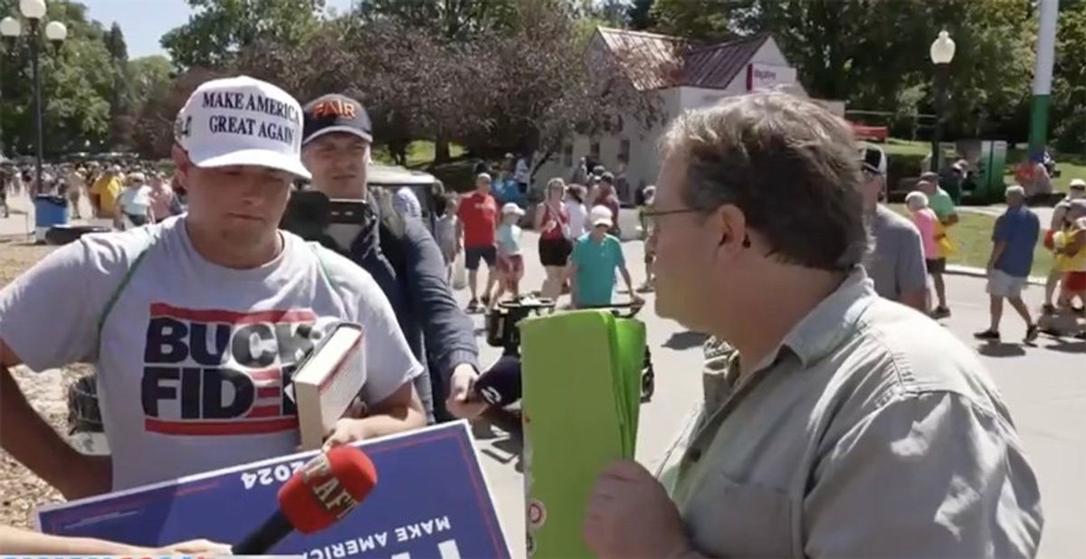 Watch: Ex-Trump voter lectures current supporter in Iowa State Fair confrontation