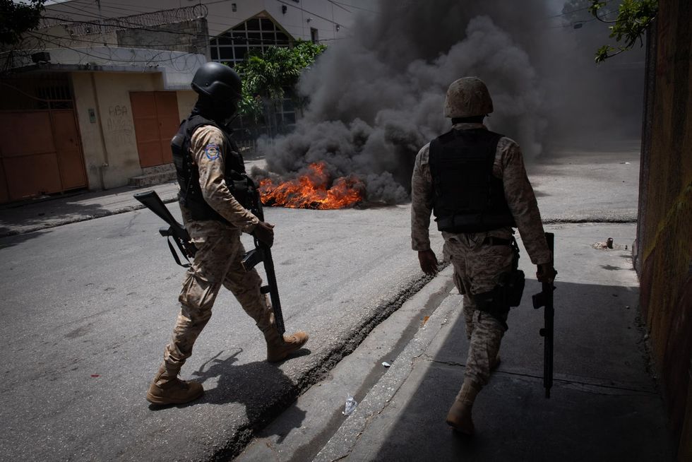 As more Haiti neighborhoods fall to gangs, US sends deportation flight