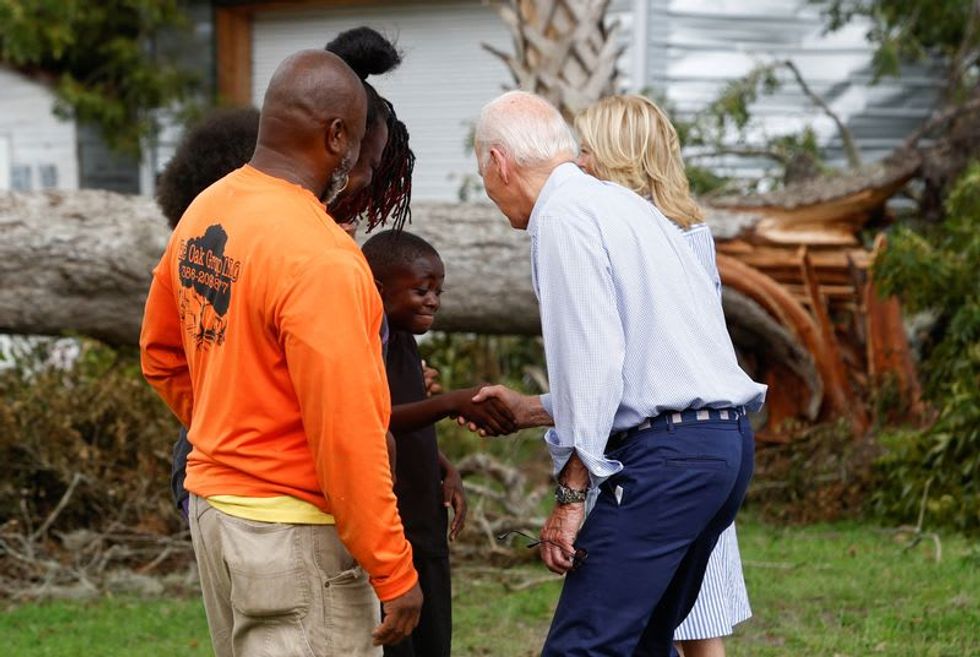 Biden surveys storm damage in Florida, without DeSantis