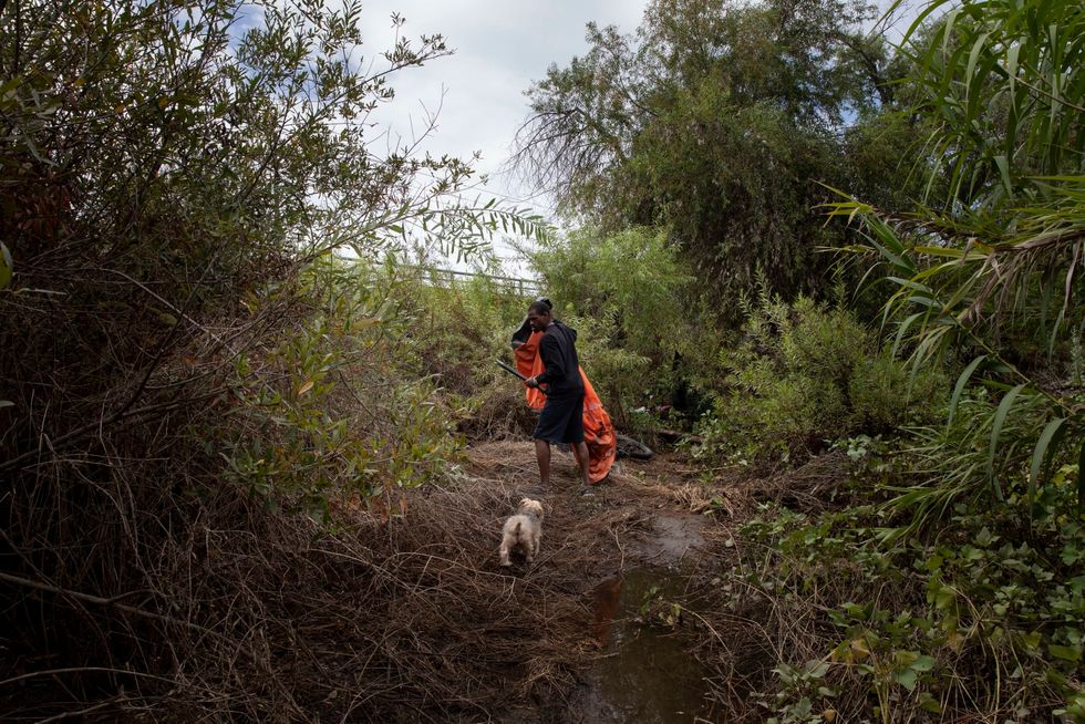 San Diego's camping ban may push homeless people to the riverbed, where encampments have been rising