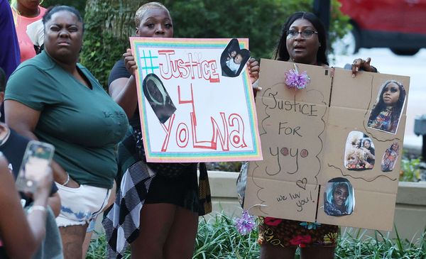 Group rallies for answers after woman found hanging from tree in Orlando