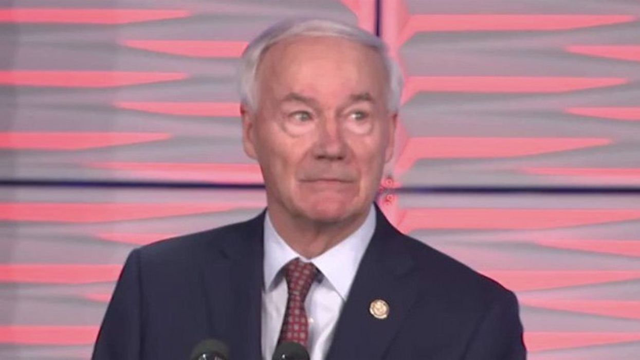 Rallygoers try to drown out ex-GOP lawmaker as he tells them Trump will be found guilty