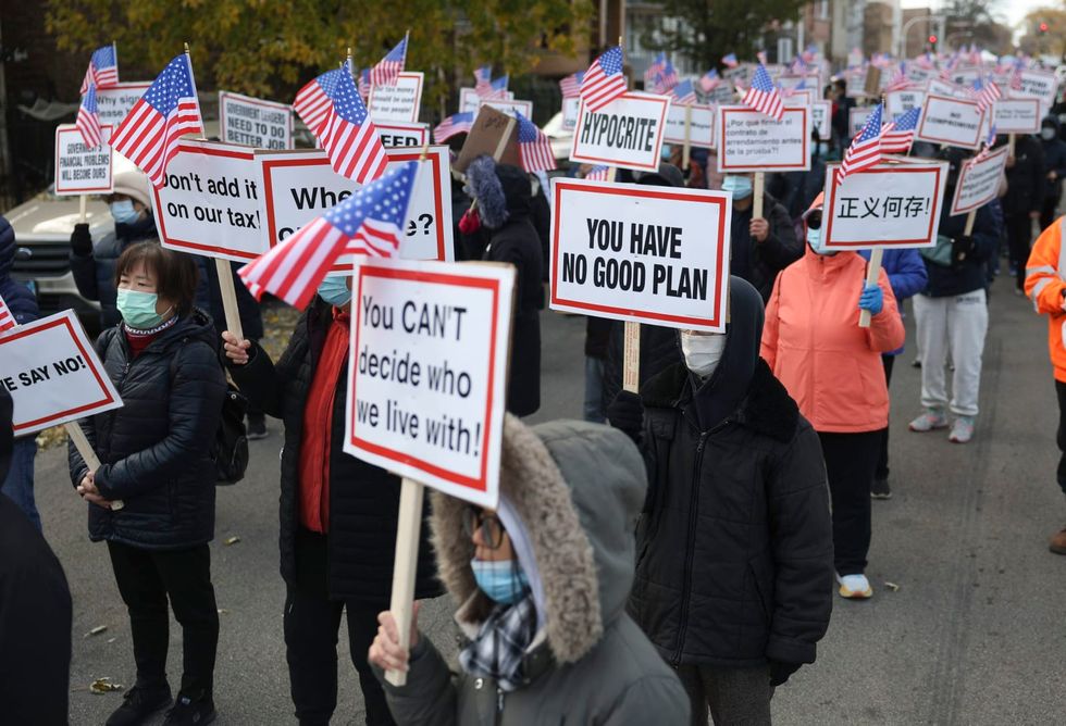 Hundreds march in Chicago's Brighton Park to protest tent encampment for migrants