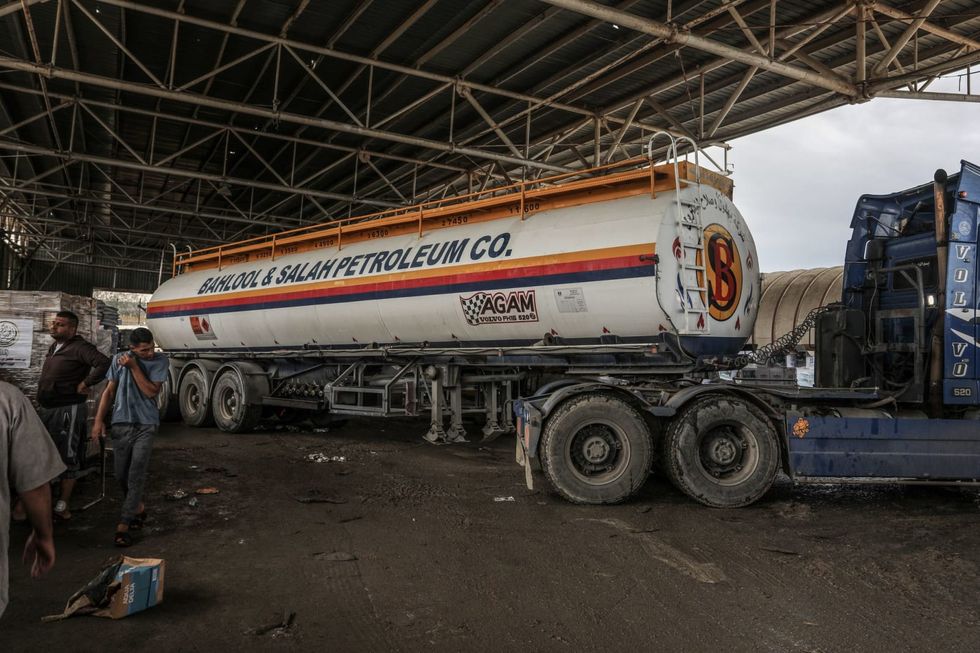 Confusion over Gaza supplies as Israel allows limited fuel delivery