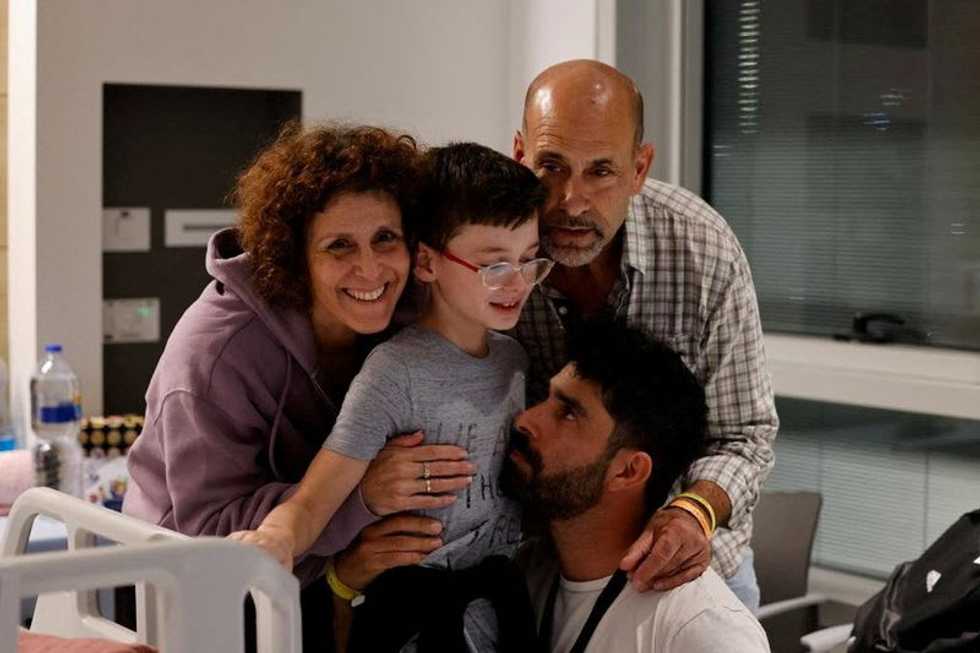 Rubik's Cube-loving 9-year-old among hostages freed from Gaza