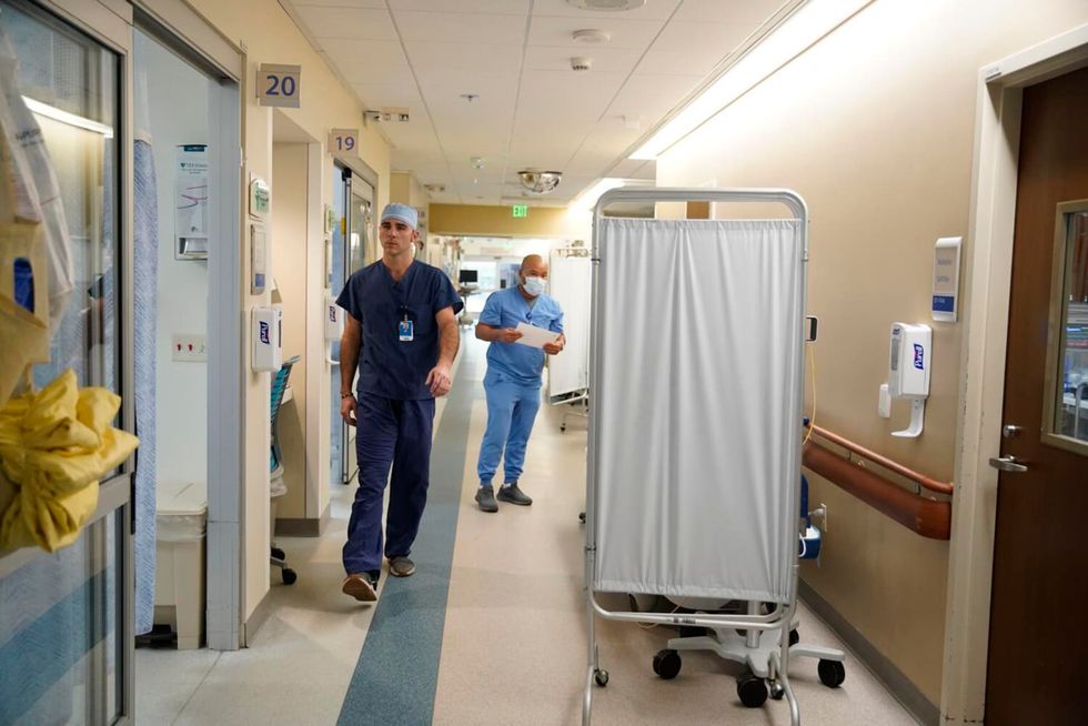 Long waits for rooms leave patients in ER hallways. Could new law worsen the problem?
