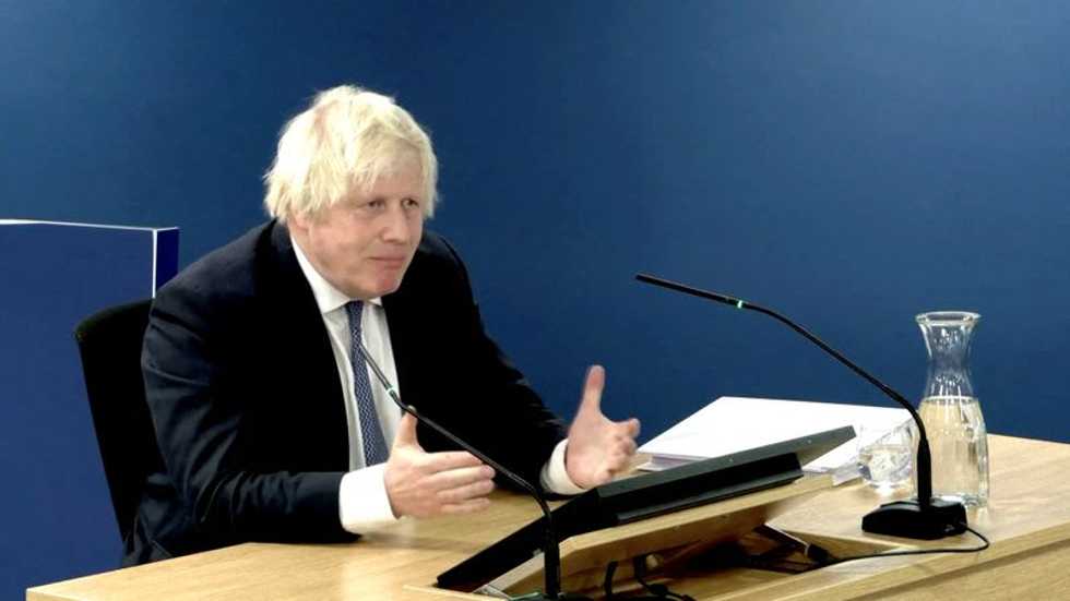 Former UK PM Johnson denies he wanted to let COVID 'rip'