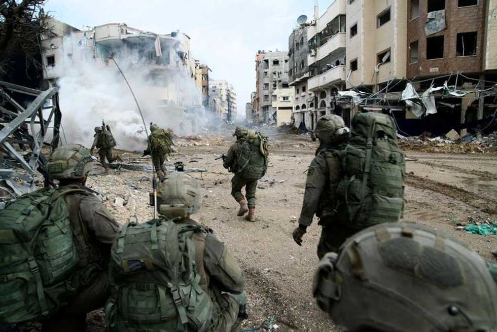Israeli forces launch strikes up and down Gaza strip; hospital hit