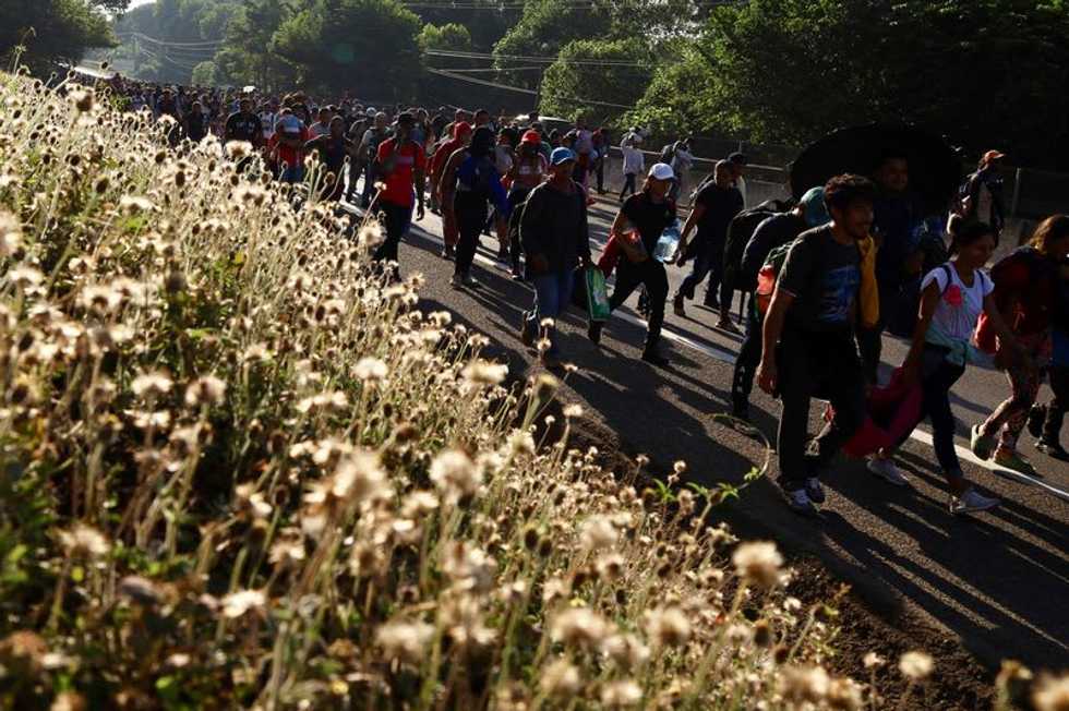 Migrants spend Christmas on the road before heading to U.S. border