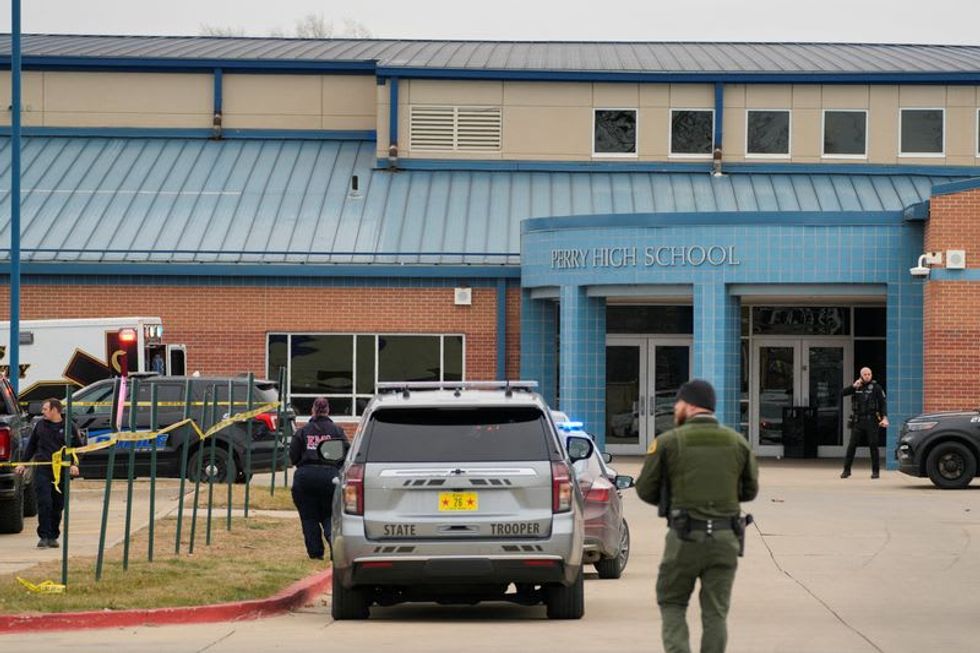 In Iowa, school shooting prompts Republican prayers, while Trump campaigns by proxy