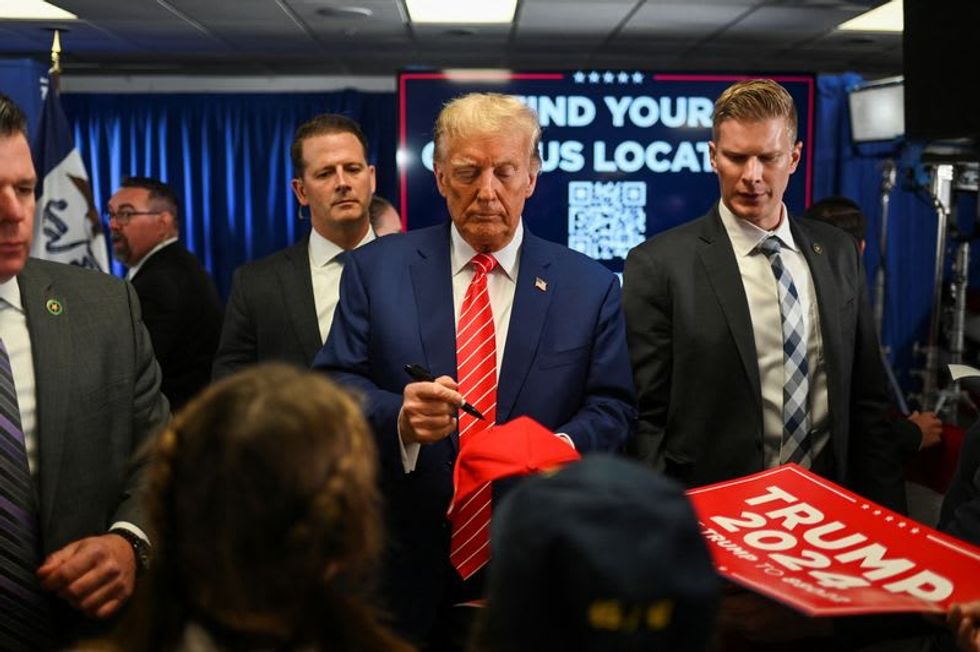 Trump, in Iowa, skirts Jan. 6 talk on attack's anniversary