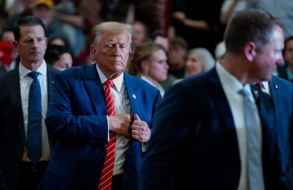 Trump presses immunity claim, says he could prosecute Biden if re-elected